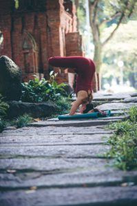 Woman Doing Yoga Pose Outdoors 