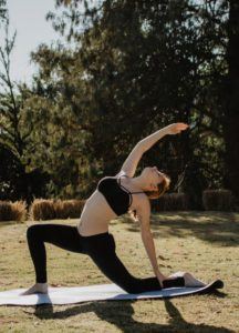 Woman Doing Yoga and Experiencing Vitality and Yoga
